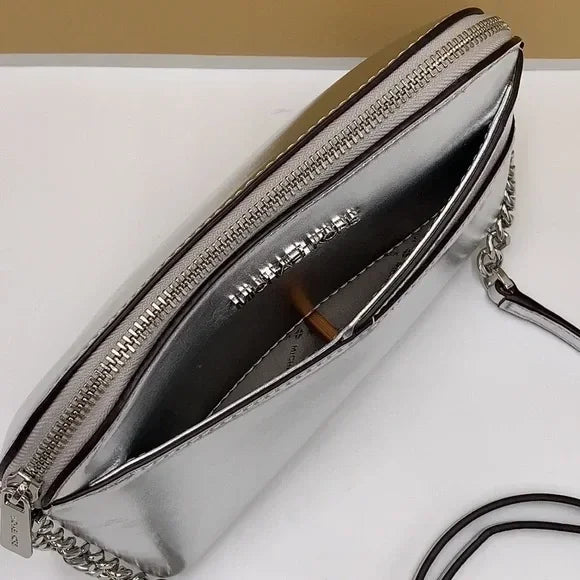 Michael Kors Silver Dome Crossbody Bag, Outside pocket, Inside 2 slip Pockets
