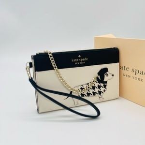 Kate Spade Fetch Medium Wristlet. Inner credit card slot. 8" W x 5.2" H x 0.9" D