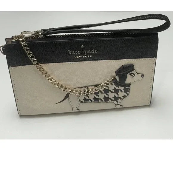 Kate Spade Fetch Medium Wristlet. Inner credit card slot. 8" W x 5.2" H x 0.9" D