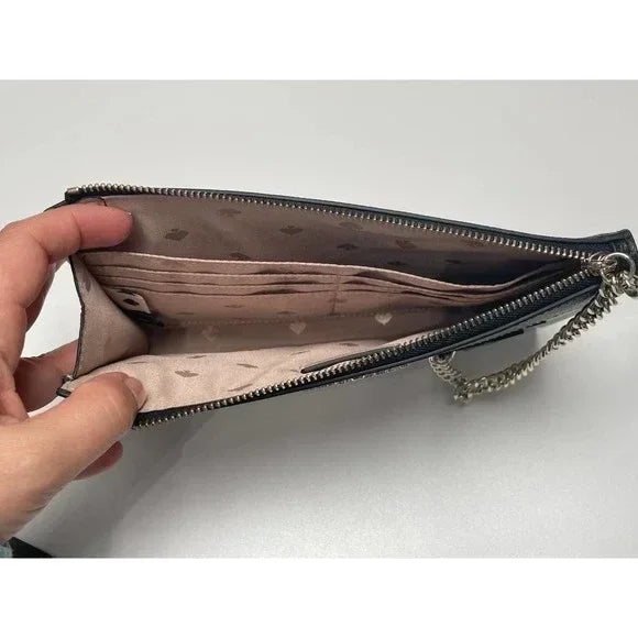 Kate Spade Fetch Medium Wristlet. Inner credit card slot. 8" W x 5.2" H x 0.9" D