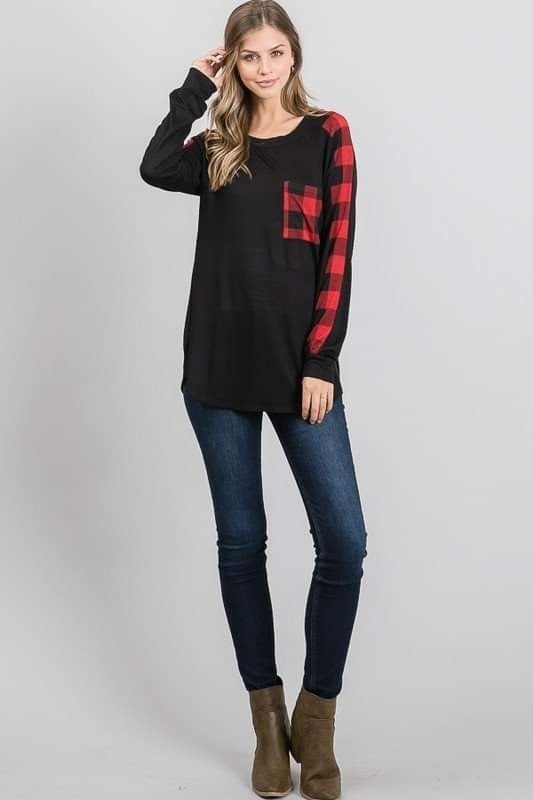 Extremely Soft and Stretchy Black with Red Plaid Arms and Pocket Runs a bit Big. Made in the USA