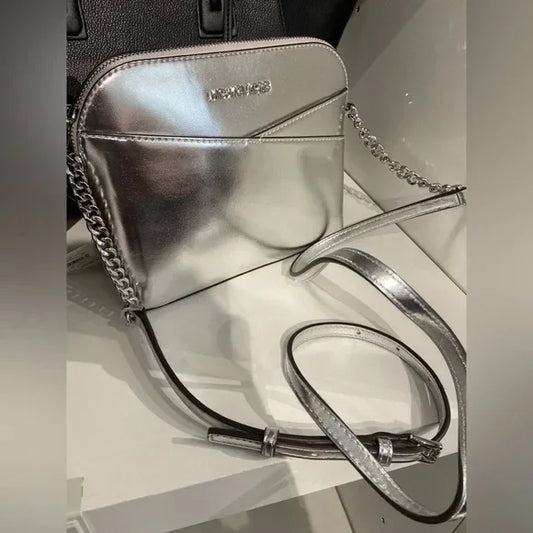 Michael Kors Silver Dome Crossbody Bag, Outside pocket, Inside 2 slip Pockets