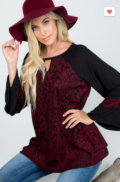 Burgundy & Black Leopard Print with Flare/Ruffle Sleeves. Key Hole Neckline Runs Big, Size Down.